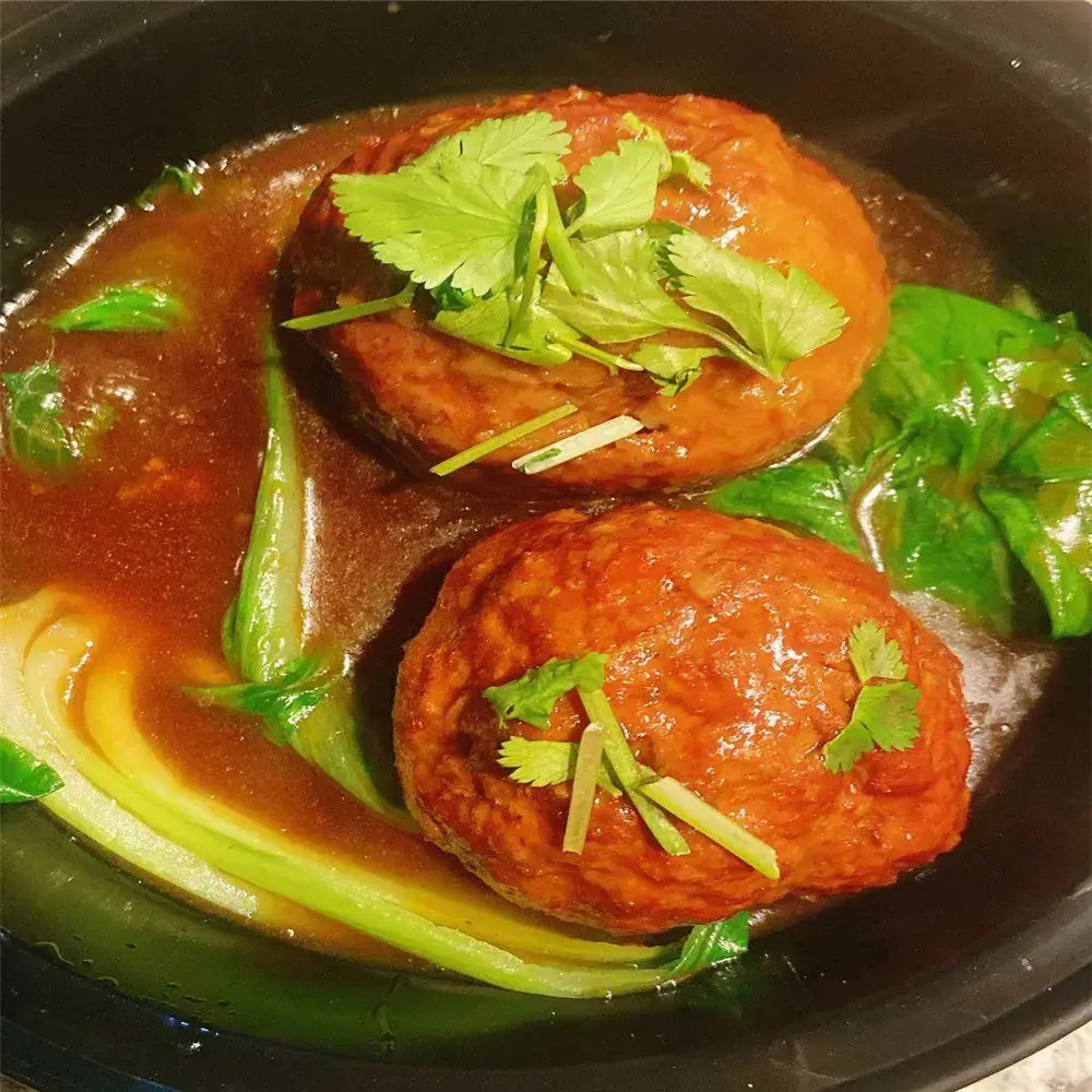 Meet-Up-Restaurant-Chinese-restaurant-Four-Happy-Meatballs-CA Four - Happy Meatballs are large braised meatballs garnished with cilantro at Meet Up Restaurant, a Chinese restaurant in CA