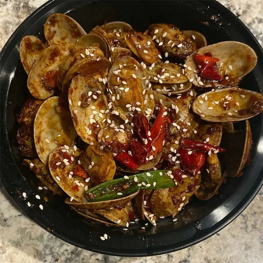 Meet-Up-Restaurant-Chinese-restaurant-Spicy-Fried-Clams-CA Spicy - Fried Clams are clams stir - fried with spices at Meet Up Restaurant, a Chinese restaurant in CA